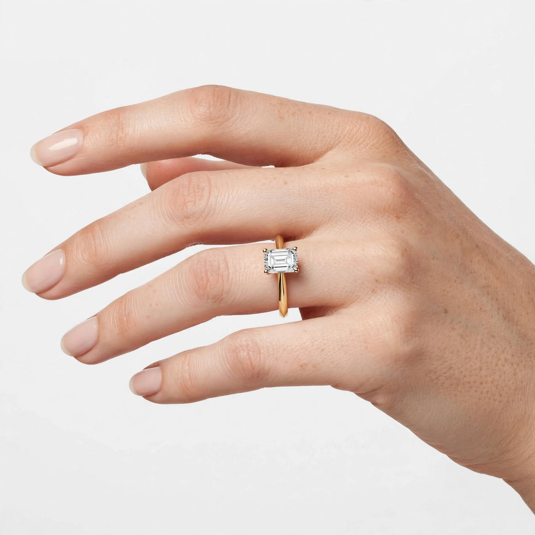 1.02CT Emerald Cut Lab Grown Diamond Solitaire Ring In 14K Gold